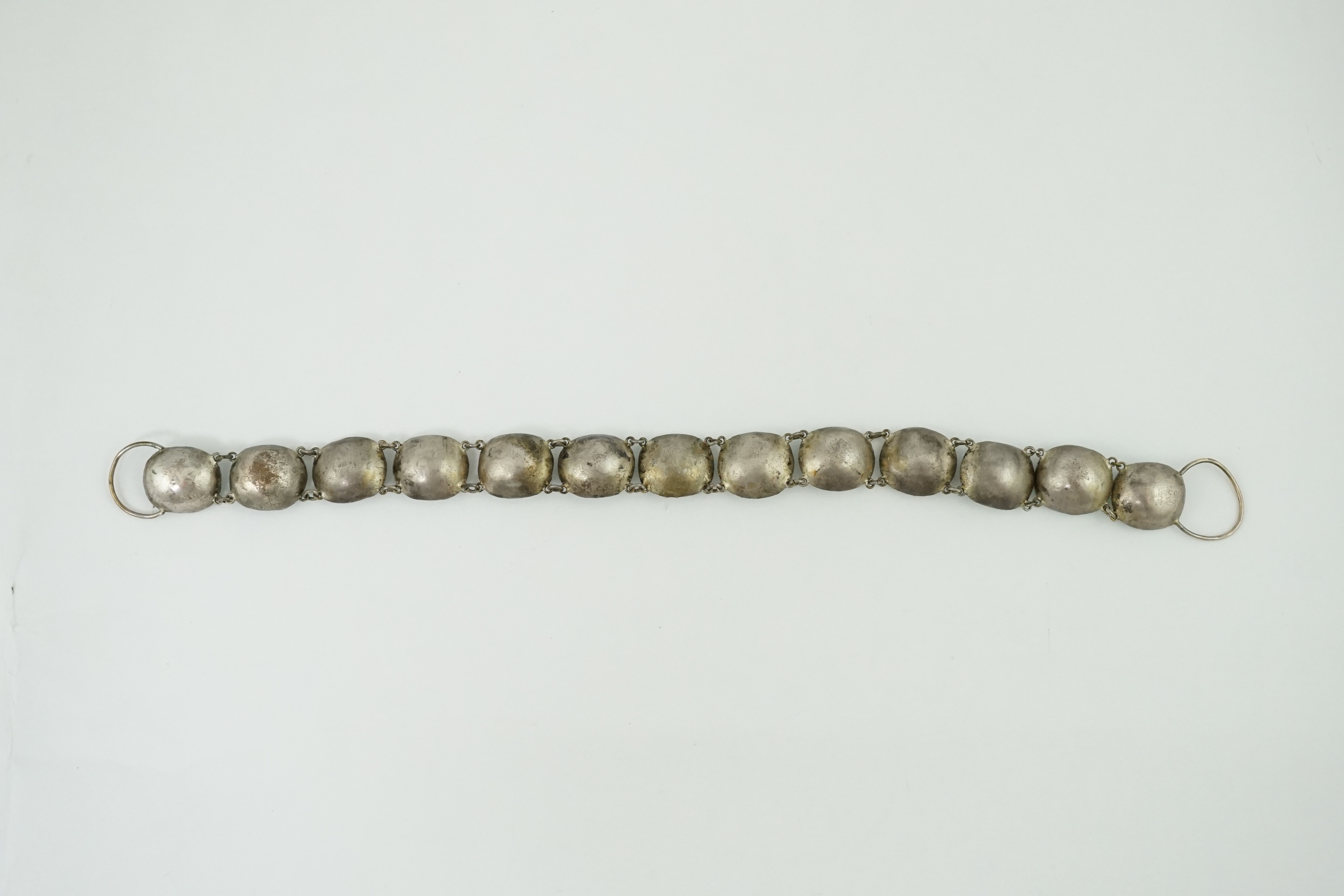 A rare 18th century 'Queen Anne' silvered metal and foil backed aquamarine paste necklace